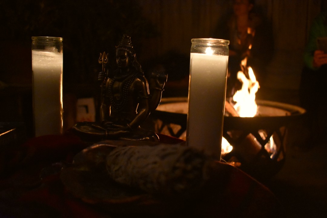 The space is carefully created by a woman who has been working as a spiritual healer for almost 20 years. A passerby might call the candles, crystals, and burning sage ‘witchy,’ but her goal is only to do what feels right for herself and those who’ve come to her ceremony. No labels here.